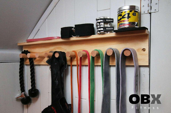 OBX, OBX Fitness, OMOIBOX, wood, wooden, custom, home gym, rogue fitness, best, portable, Personalized, Multi-Purpose, Gym Shelf,  Hanger, Gym Wall Organizer, Storage Rack, Resistance Bands, Lifting Belts, Chains, Jump Ropes, gym wall shelf, Belt and Band Hanger, Titan Depth, Rogue, wall mount, Resistance Band, Gym Band Storage, Storage Rack, wall storage, wall rack, wall organizer, Lifting belt storage  